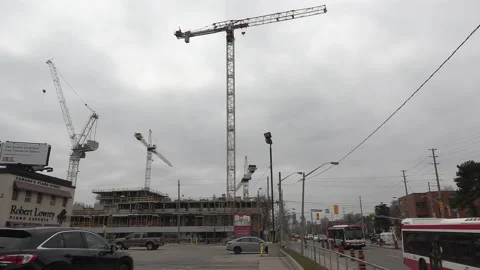 Construction cranes building new condominium development near Toronto Stock Footage 151187425
