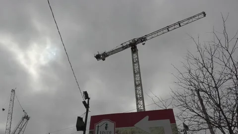 Construction cranes building new condominium development near Toronto Видео 151187512