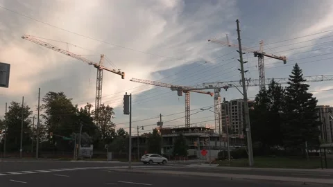 Construction cranes building new condominium development near Toronto Stock Footage 156435031