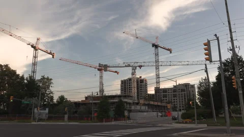 Construction cranes building new condominium development near Toronto Video stock 156461784