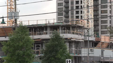 Construction cranes building new condominium development near Toronto Vídeo Stock 156463697