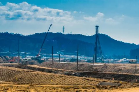 Construction cranes at construction site. Stock Photos