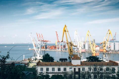 Construction cranes, crane loader in the port. Stock Photos