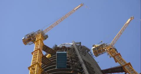 Construction cranes on Dubai skyscraper Stock Footage 341801334