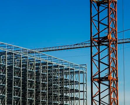 Construction cranes with a metal structure frame Foto stock