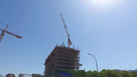 Construction Cranes Moving on Tall Building in Portland  Stock Footage 92450459