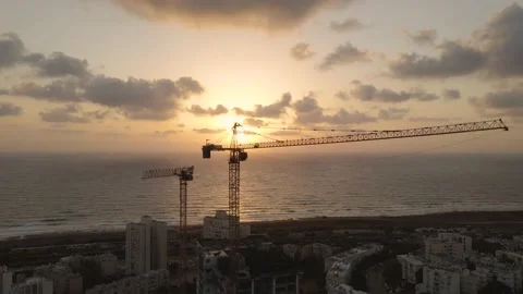 Construction Cranes near the Sea Stock Footage 157308599