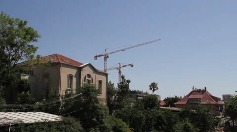Construction cranes in Neve Tzedek Stock Footage 51329488