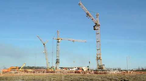 Construction cranes operate on the object Stock Footage 61544327