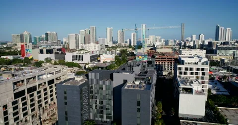 Construction cranes over Wynwood Stock Footage 231734870