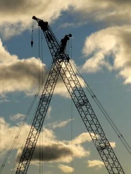 Construction cranes silhouettes Stock-Fotos