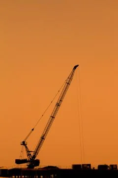 Construction cranes silhouettes Stock Photos