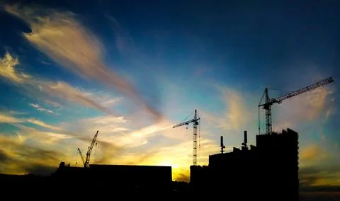 Construction cranes silhouettes 스톡 사진