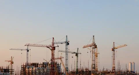 Construction cranes in the sky Stock Photos