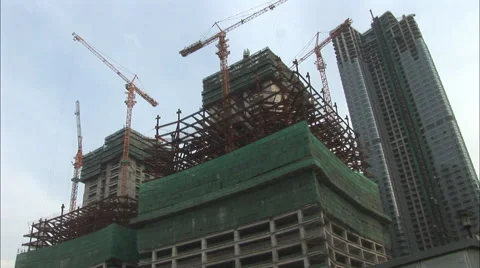 Construction cranes on skyscraper, China Stock Footage 56603503