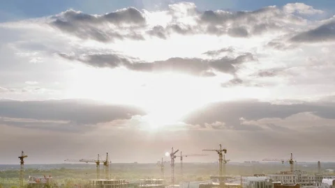 Construction cranes at sunset. Time lapse Stock Footage 107381559