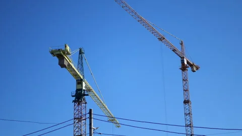 Construction cranes Tower cranes Building site machinery Stock Footage 295531667