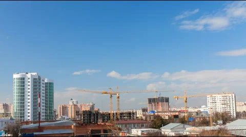 Construction cranes work from morning till evening Stock Footage 52339358