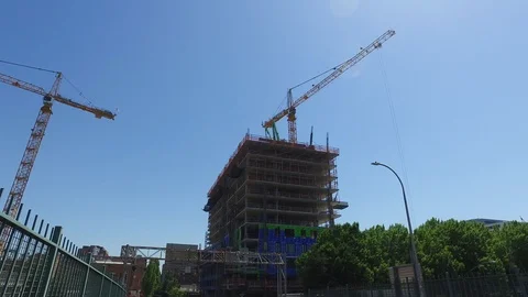 Construction Cranes Workgin on Tall Building in Portland  Stock Footage 92450471