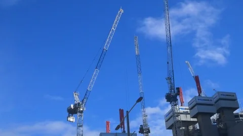 Construction cranes working on a high-rise time lapse Stock Footage 92914525