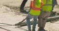 Construction Crew Paving Roadway HD Footage