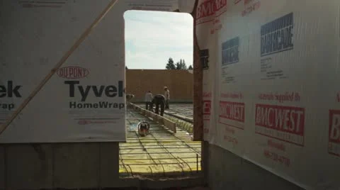 Construction crew prepares concrete forms Stock Footage 21557578