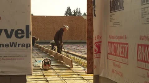 Construction crew prepares concrete forms Stock Footage 21557613