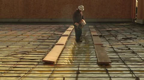 Construction crew prepares concrete forms Stock Footage 21558189