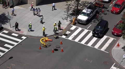 Construction Crew working on intersection sewer system at in Washington DC 4k Video stock 68925130