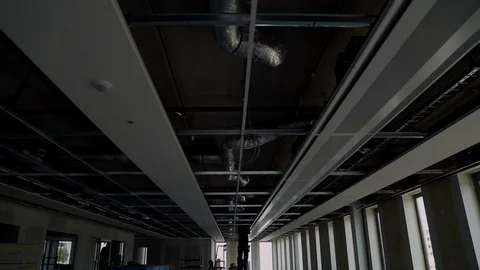 Construction Crew Working on an Office Ceiling Stock Footage 95850302