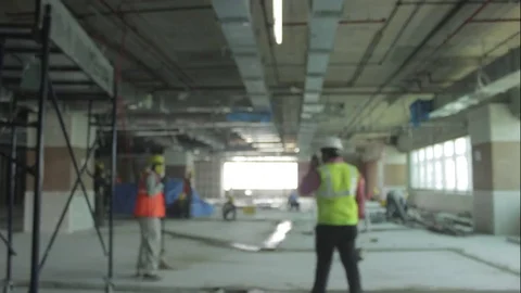 Construction Crew Working Together on a Building Interior Time lapse Vídeos de archivo 72452794