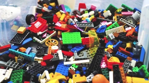 Construction of cubes. Child playing in children's room. Constructor assembly Stock Footage 210000975