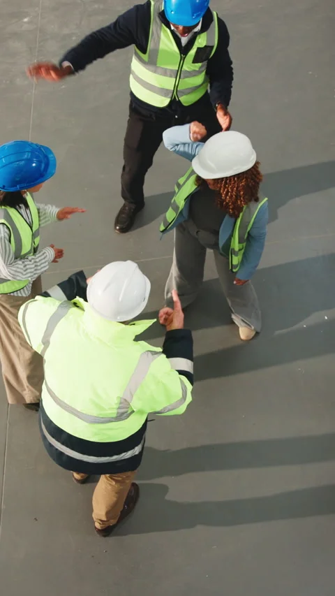 Construction, dancing and people in circle with success, excited and celebration Stock Footage 343822193