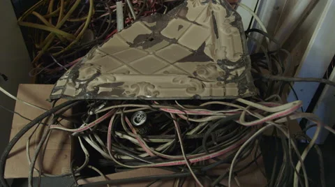Construction Debris with Boxes, Electrical Wires and Ceiling Tin 動画素材 61504135