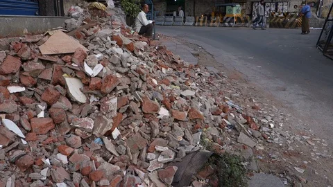 Construction-debris-on-the-footpath Stock Footage 91681688