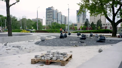 Construction debris lays around newly built city park Stock Footage 246053889