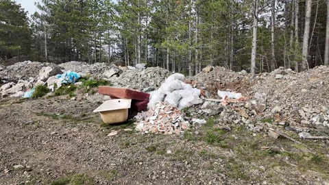 Construction Debris Pollution in Forest Stock Footage 288832460