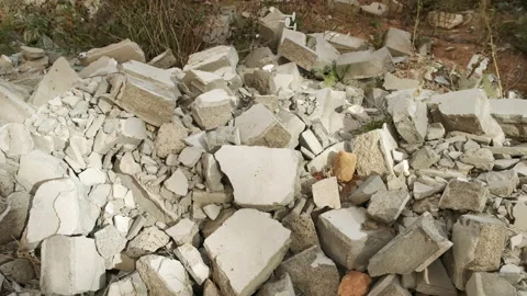Construction debris on site with broken panels and bricks, closeup view. Stock Footage 145545418