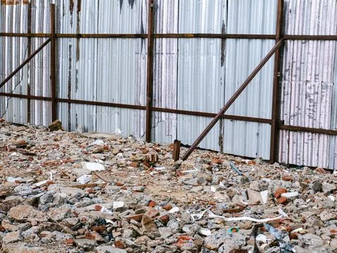 Construction Demolition Site Rubble with Broken Concrete and Corrugated Met.. Foto stock