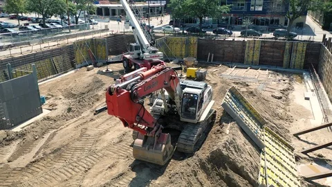 Construction Digger Jib Shot On-Site Aerial Drone Shot 4K 스톡 동영상 118548319