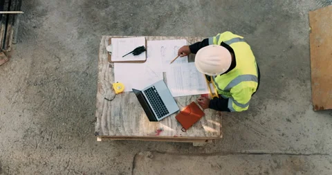 Construction, documents and above of man for planning, building design and Stock Footage 335940272