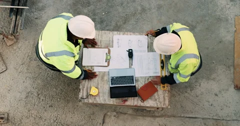 Construction, documents and above of people for planning, building project and Stock Footage 335938022
