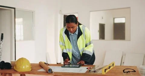 Construction, documents and woman on tablet with blueprint, planning and drawing Stock-Fotos