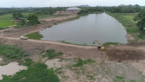 Construction Dredging for Canal and Dam in Uthai Thani Stock Footage 296514054