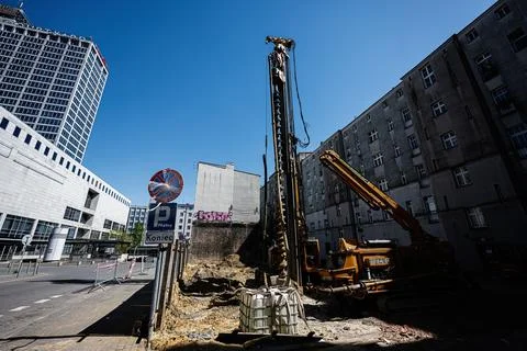 Construction drilling rig and excavator at an urban worksite in Katowice, P.. Stock Photos