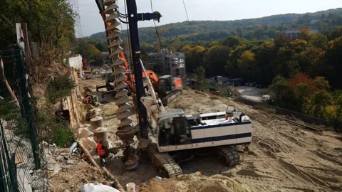 Construction drilling rig with continuous flight auger Video stock 347793872