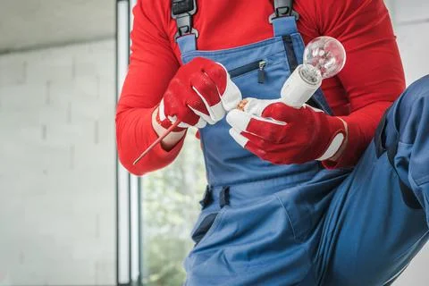 Construction Electric Contractor Installing Light Point Stock Photos