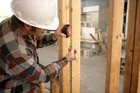 Construction Electrician Measuring Stock Photos