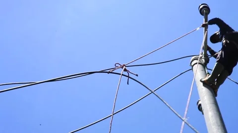 The construction of electricity poles and cables Stock Footage 268427391