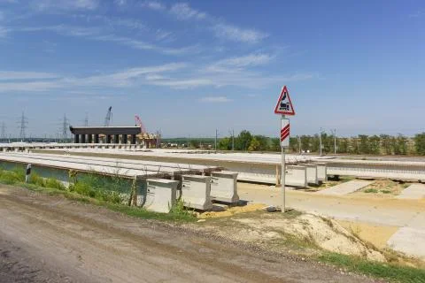 Construction of an elevated bridge over the railway tracks. Car sign railway  Foto stock